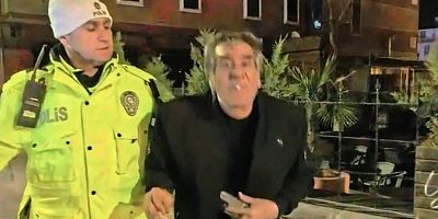 Alkollü yakalandı, gazetecilerin yüzünü tükürdü