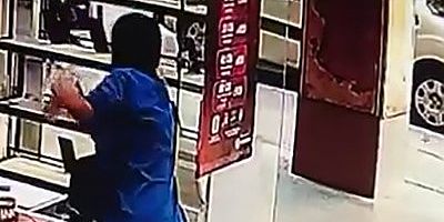 Bursa'da  iş yeri sahibinin dalgınlığından faydalandı, telefonu böyle çaldı